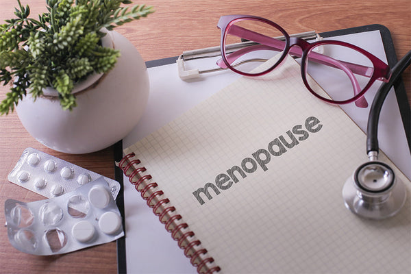 the word menopause on a journal cover 