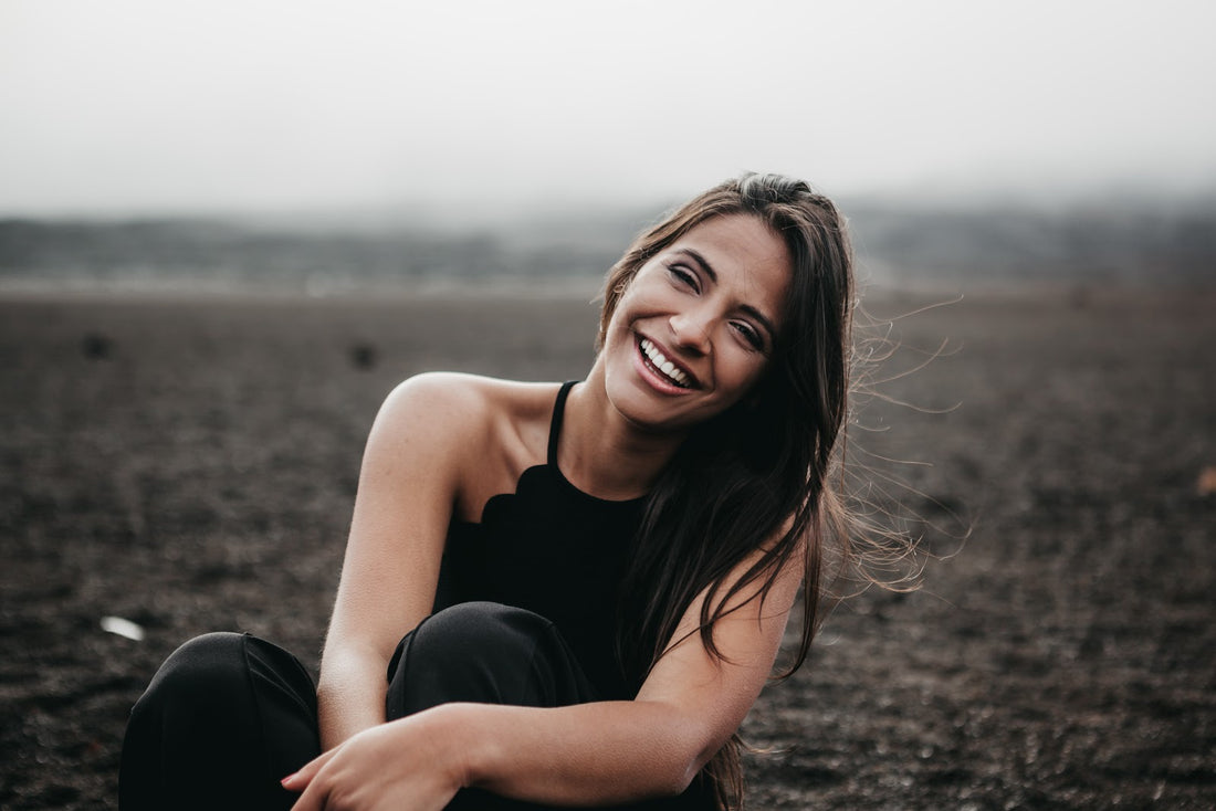 Smiling woman on a beach