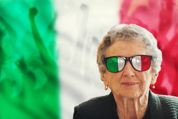 woman with green and red glasses