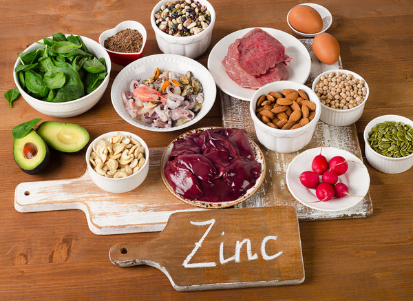 the word zinc surrounded by healthy food 